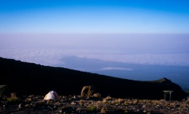 a tent in a rocky area